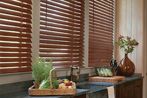 Faux wood blinds in modern kitchen.